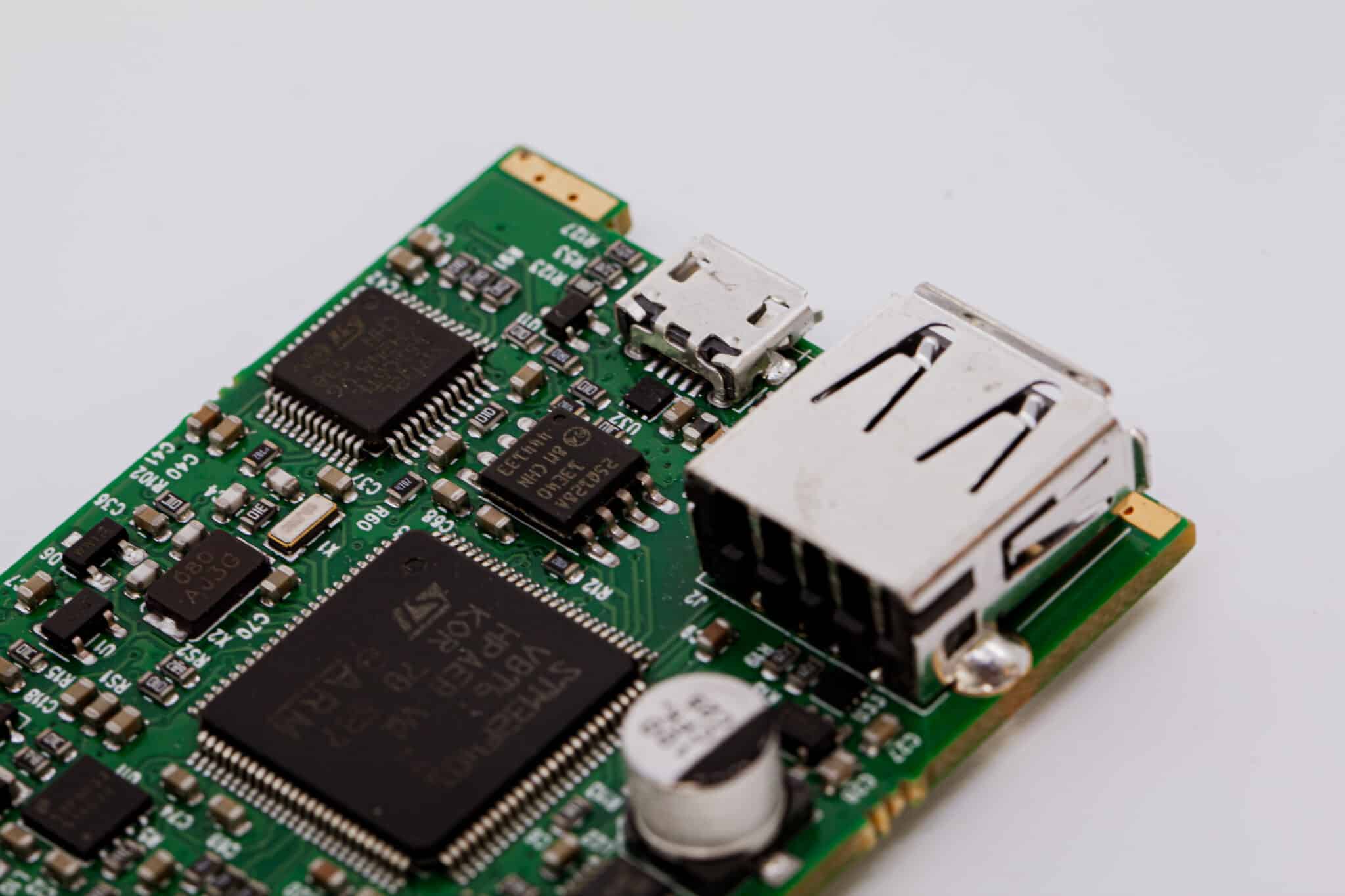 Printed circuit board with different components including a USB port